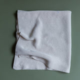 Manta de punto beige