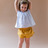 Short niña mostaza