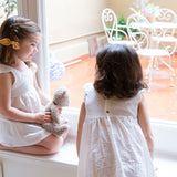 Vestido punto smock rayitas blancas
